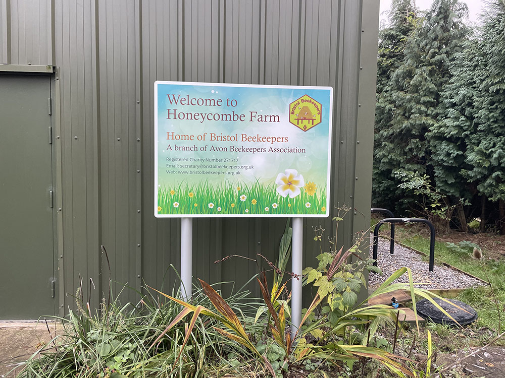 Welcome to Honeycomb Farm sign